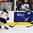KAMLOOPS, BC - MARCH 29: Sweden's Jenni Asserholt #4 skates with the puck while Japan's Shiori Koike #2 defend during preliminary round - 2016 IIHF Ice Hockey Women's World Championship. (Photo by Matt Zambonin/HHOF-IIHF Images)

